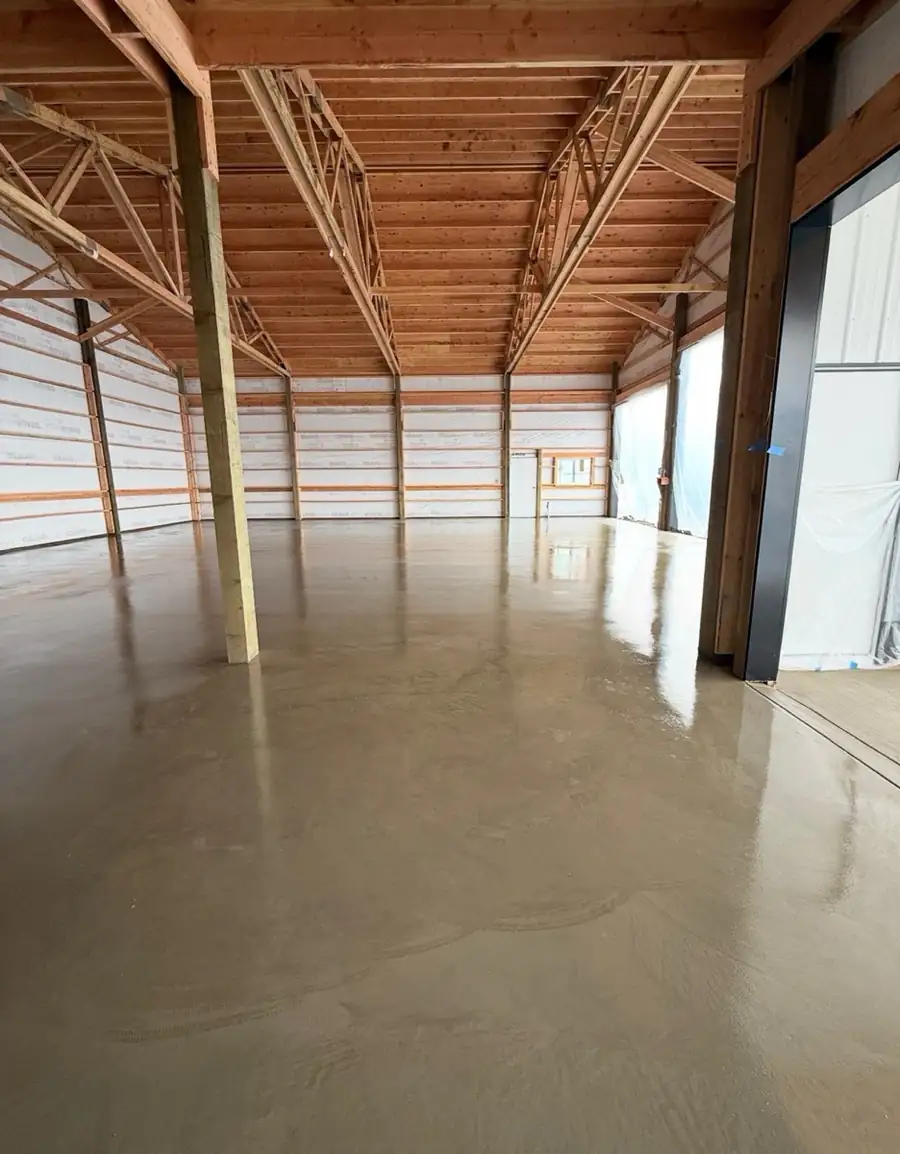 Smooth commercial concrete floor inside an open structure